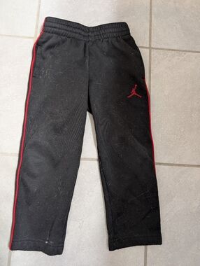 Nike Jordan Therma Fit Black Sweatpants with Red Trim and Jumpman, Size 4